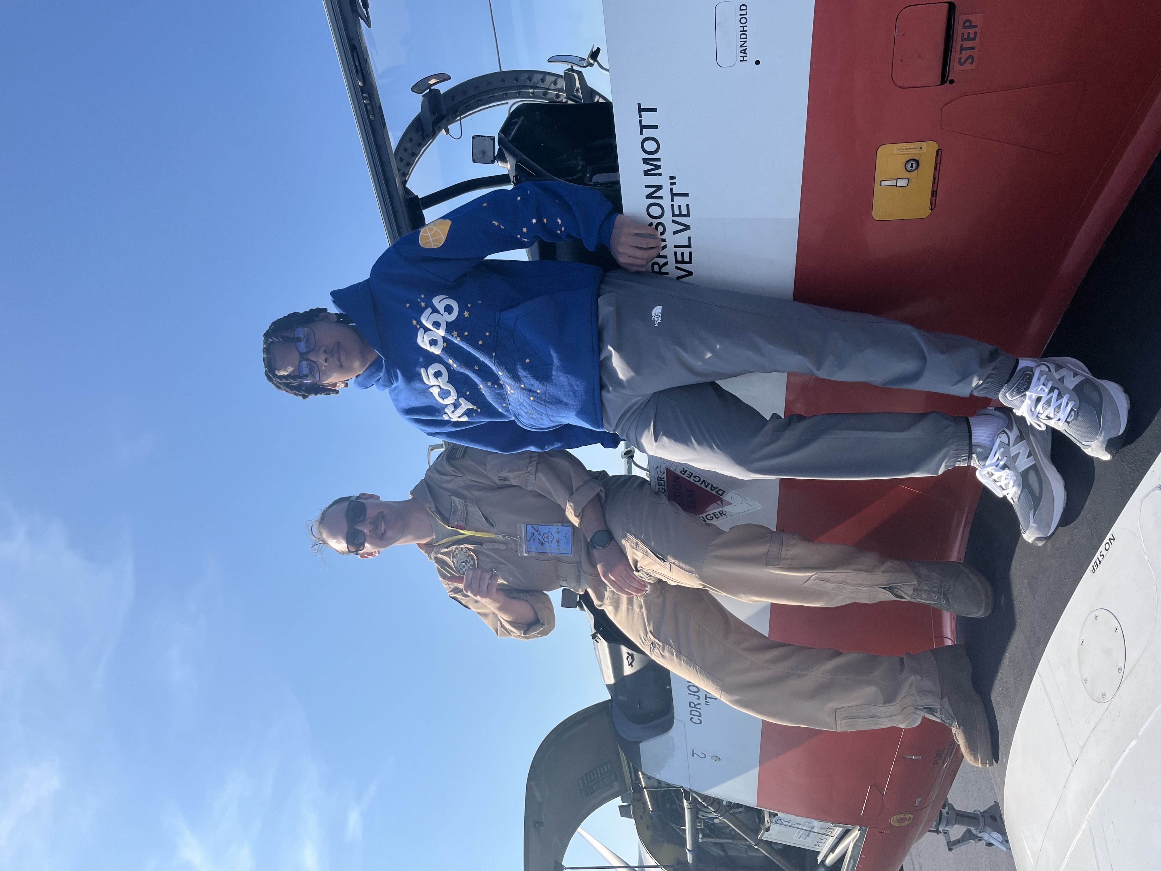 Tiago Antunes photographed while standing on the wing of an airplane with a flight instructor